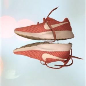 Pink gently worn Nike shoes